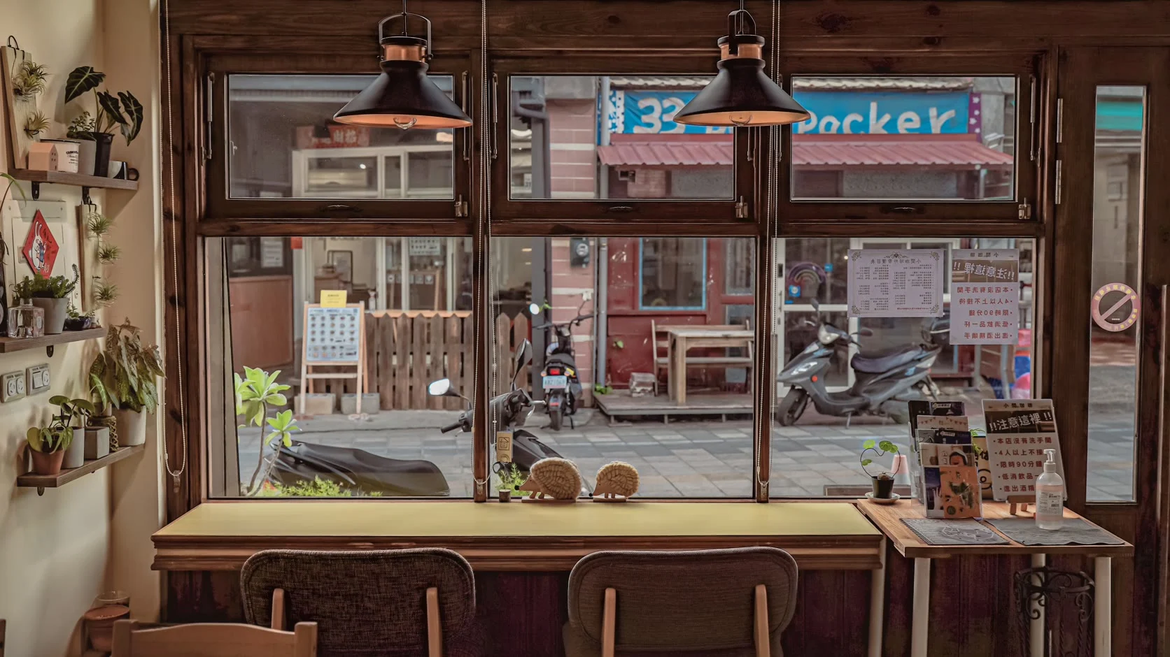 A café counter along a sunlit window